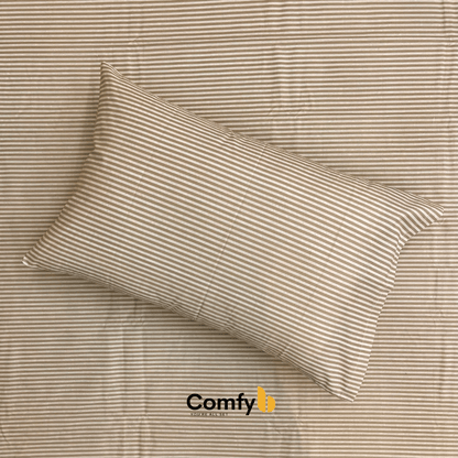Elevate your bedding with Comfyb Stripes Poly Cotton 50/50 Fitted Sheet Sets, featuring a striped fitted sheet and pillowcases in soft tones. Crafted from a 50/50 poly-cotton blend, these sets require no ironing. Available in single (two 120×200+30 cm fitted sheets, two 50×75 cm pillowcases), double (180×200+30 cm fitted sheet, two 50×75 cm pillowcases), and king sizes (200×200+30 cm fitted sheet, two 50×75 cm pillowcases), each ensures a comfortable night's sleep.