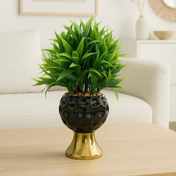 ARTIFICIAL GREEN PLANT IN A DECORATIVE GOLDEN